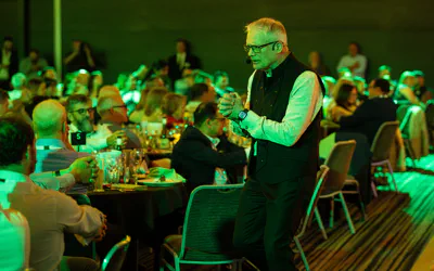 Gerard V speaking at a gala event